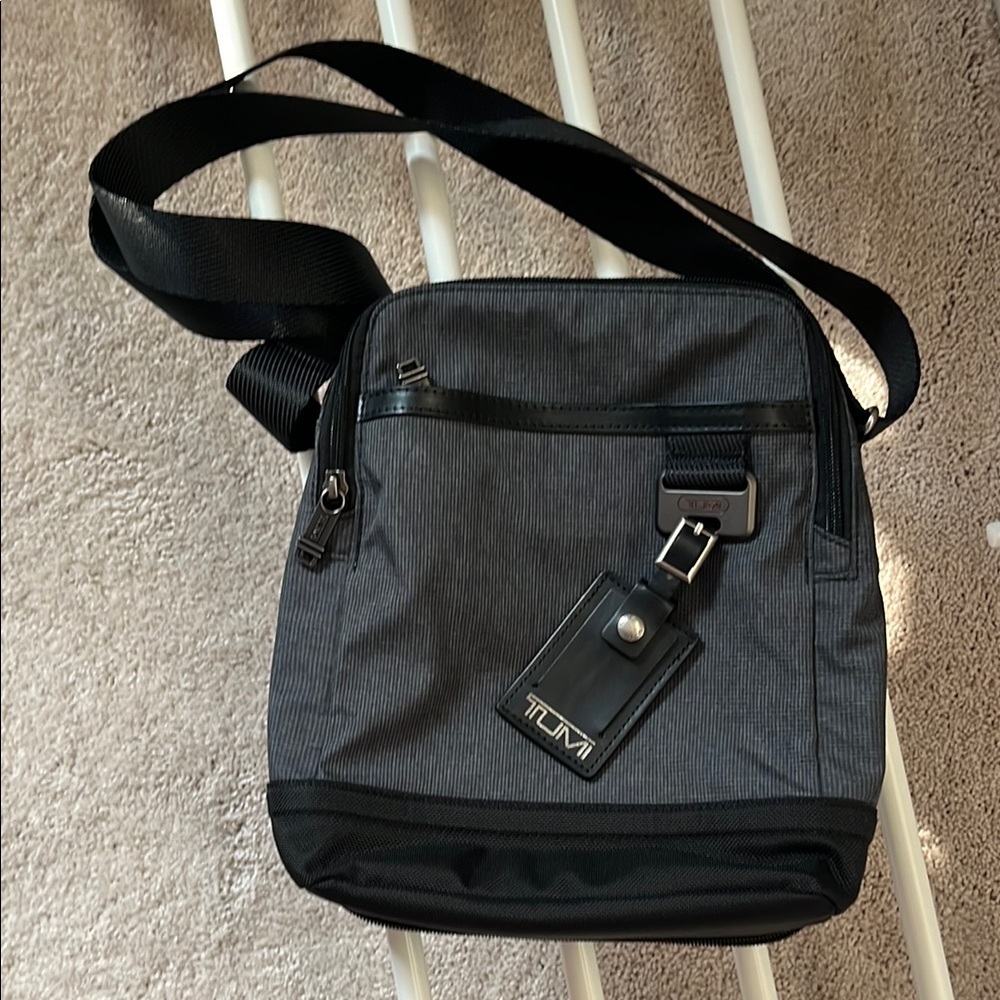 Tumi Black and Gray travel  Bag with Adjustable Strap new condition used once